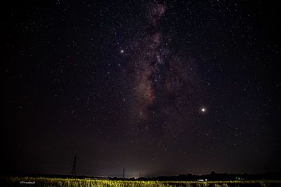 Low angle view of star field against sky at night