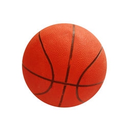 Close-up of red ball on table against white background