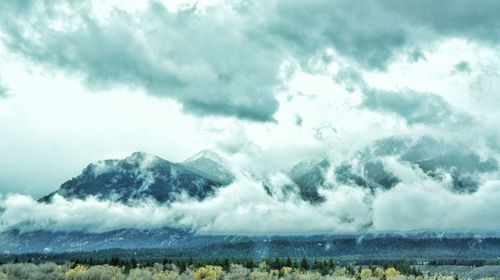 Landscape with mountain range in background