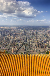 High angle view of buildings against sky in city
