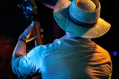 Rear view of woman wearing hat