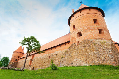 Low angle view of old building against sky