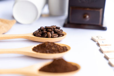 Close-up of coffee beans on table