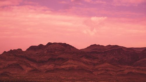 Scenic view of mountains against sky during sunset