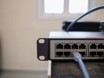 Close-up of electrical equipment on table