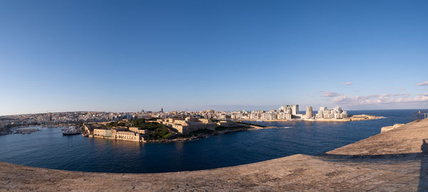 Panoramic view of vallettas city walls and the harbour