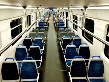 High angle view of empty vehicle seats in train