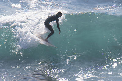 Man surfing in sea