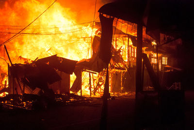Coffee shop burning at night