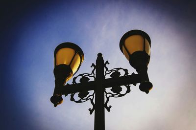 Low angle view of street light against sky