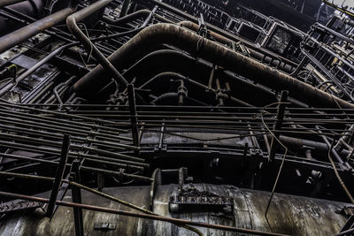 High angle view of machine part in abandoned factory