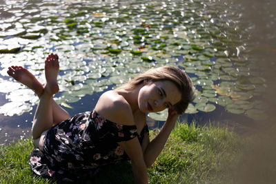 Close-up of woman relaxing outdoors