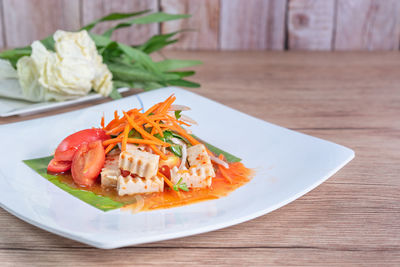 Close-up of seafood in plate on table