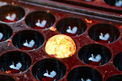 High angle view of fresh takoyaki in tray