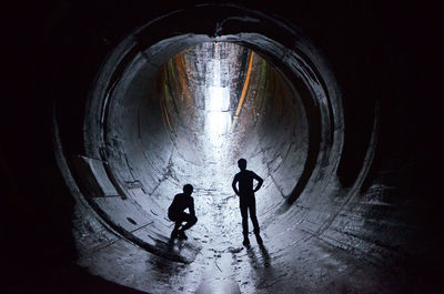 Two men in tunnel