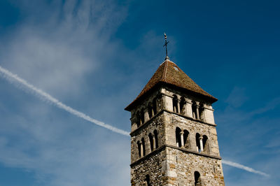 Low angle view of old church against blue sky