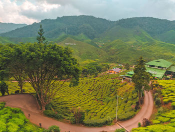 Scenic view of landscape and mountains against sky