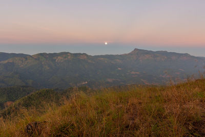 Scenic view of landscape against sky during sunset