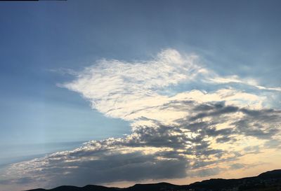 Low angle view of cloudy sky during sunset