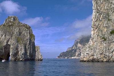 Spectacular view from the sea of the faraglioni rocks on the island of capri, italy