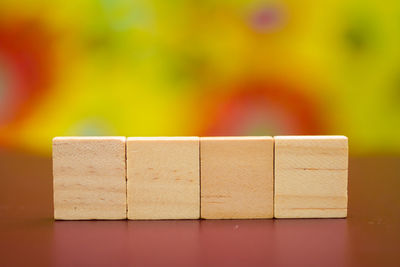 Close-up of toy blocks on wooden table