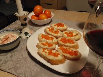 Close-up of fruits in plate on table