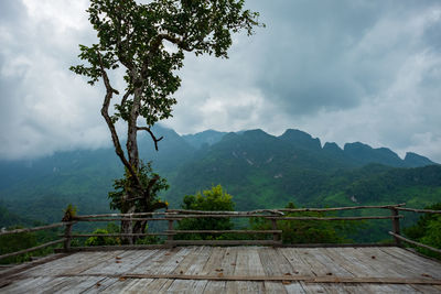 Scenic view of tree mountains against sky