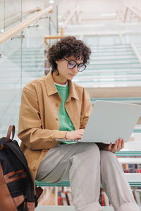 Young woman using laptop