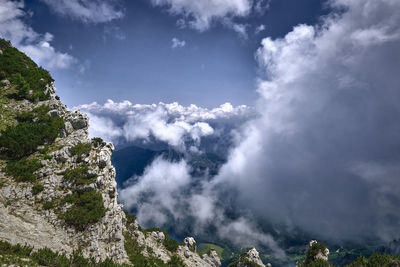 Low angle view of majestic mountains against sky