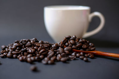 Close-up of coffee beans on table