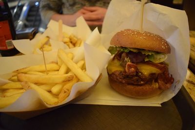 Close-up of burger and vegetables on table