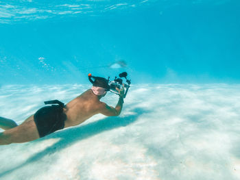 Man swimming in sea