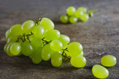 Close-up of grapes on table