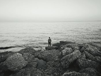 Man standing on shore