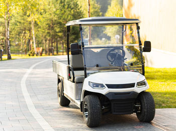 Minicar, golf car on the territory of the hotel, outdoors