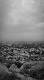 Aerial view of city against sky
