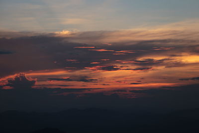 Low angle view of dramatic sky during sunset