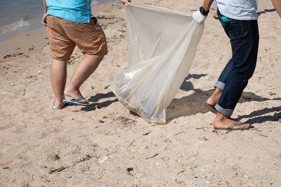 Low section of people working at beach