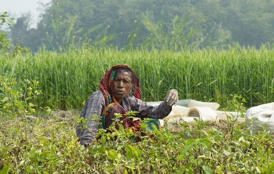 Woman working on field