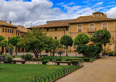 Buildings in city against sky