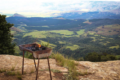 Scenic view of landscape and mountains against sky