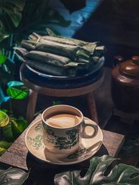 High angle view of coffee cup on table