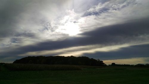 Scenic view of landscape against cloudy sky