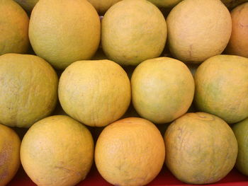 Full frame shot of sweet limes for sale at market stall