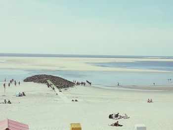 Scenic view of beach against clear sky