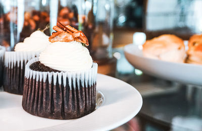 Close-up of cupcakes on table
