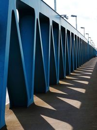 Row of built structure against blue sky