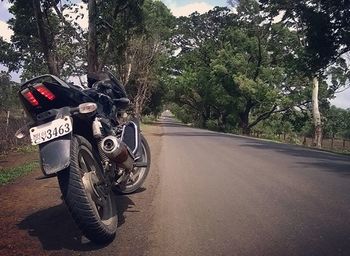 Road passing through trees