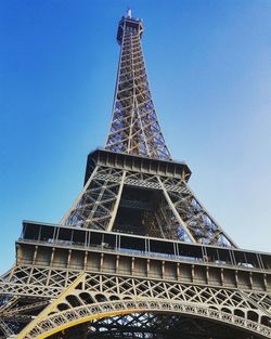 Low angle view of tower against clear blue sky