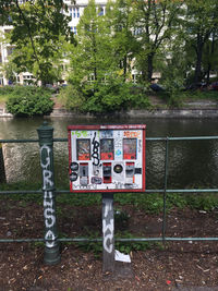 Information sign on footpath in park